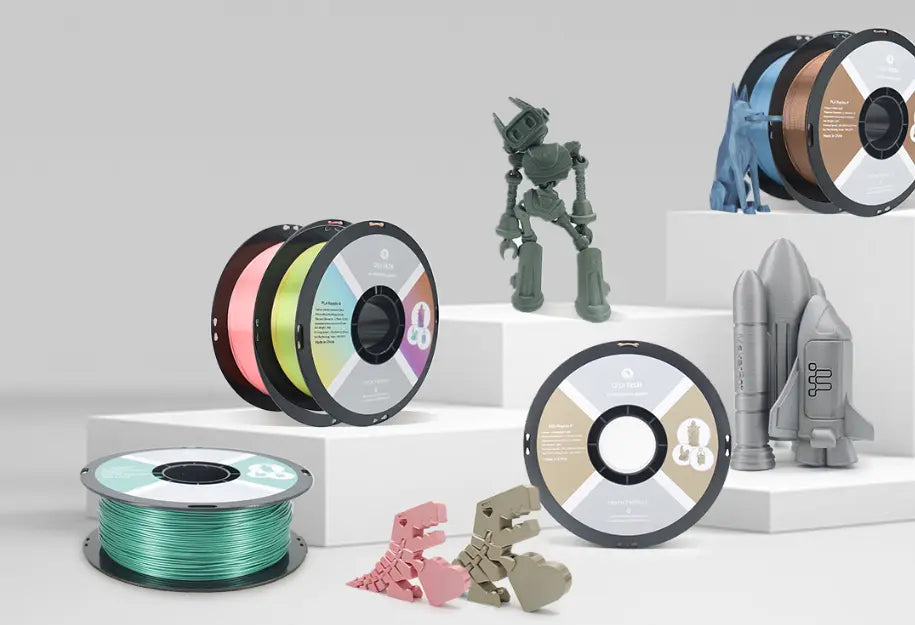 6 rolls of PLA filament in different colors and 3D printing models