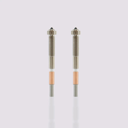Two QIDI Max4 Bimetal Nozzles with 0.2 mm diameter tips, featuring silver, white, and copper components.
