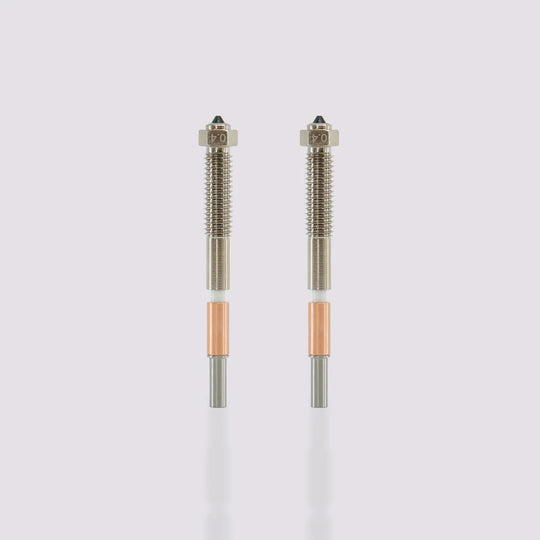 Two QIDI Tech Max4 bimetal nozzles with 0.4 mm markings