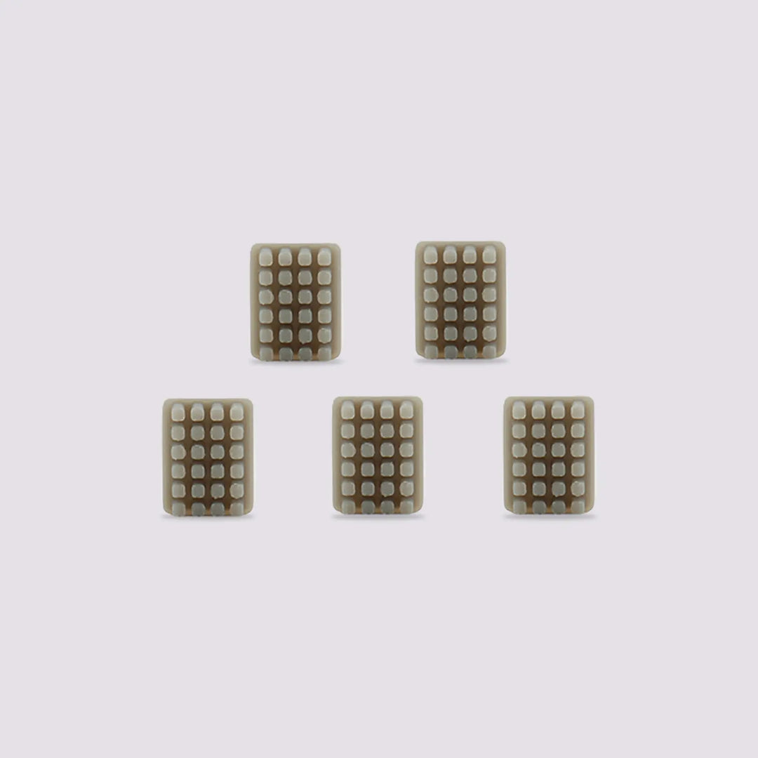 Five silicone wiper cases for Max4 3D printer, each with a grid of raised dots for cleaning.